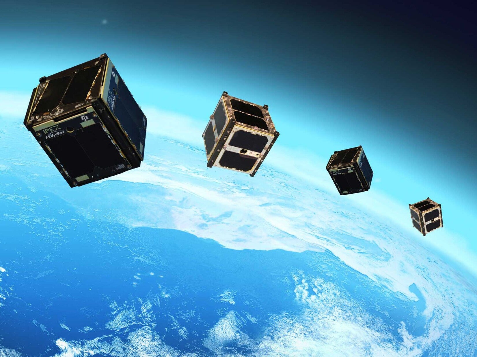 Large cubes orbiting Earth in space.