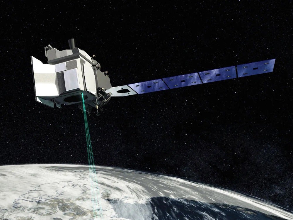ICESat-2 satellite orbiting Earth in space.